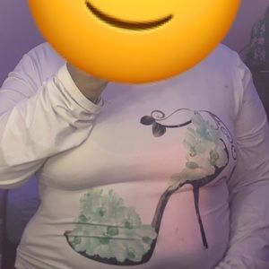 white long sleeve shirt with design of a heel